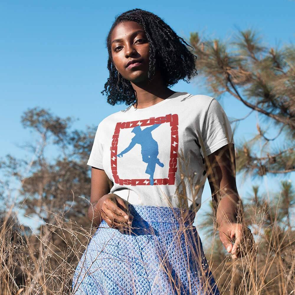 girl wearing a jazz dance t-shirt and a dress while outdoors